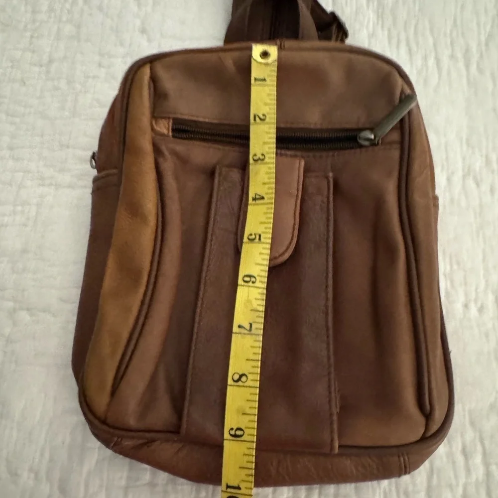C bags leather backpack can also be shoulder bag. Tan